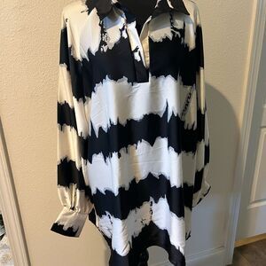 Elegant Monochrome black and white, long sleeve Women's blouse.